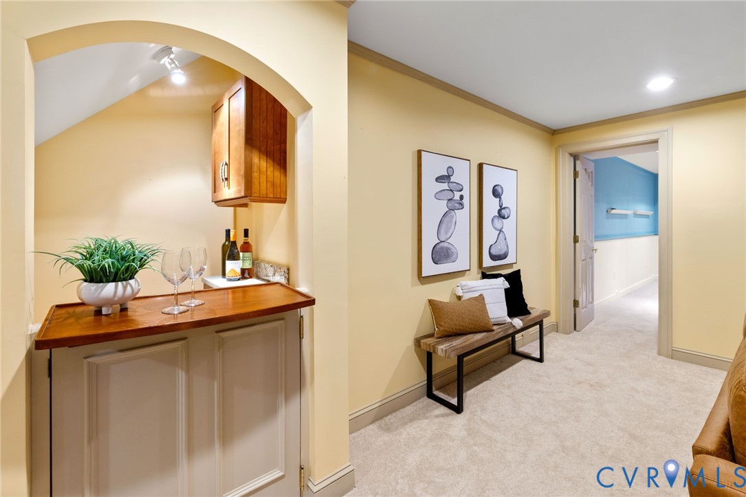 36 Dahlgren Road Richmond, VA 23238 - Photo 42 of 48 a living room with furniture and a potted plant