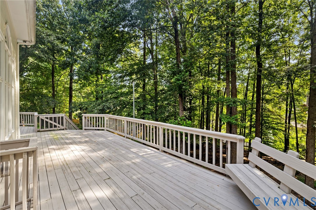 36 Dahlgren Road Richmond, VA 23238 - Photo 45 of 48 a view of balcony with furniture and wooden floor