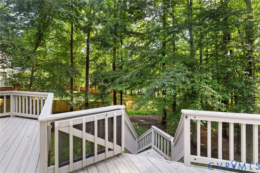 36 Dahlgren Road Richmond, VA 23238 - Photo 46 of 48 a view of balcony with wooden floor and fence