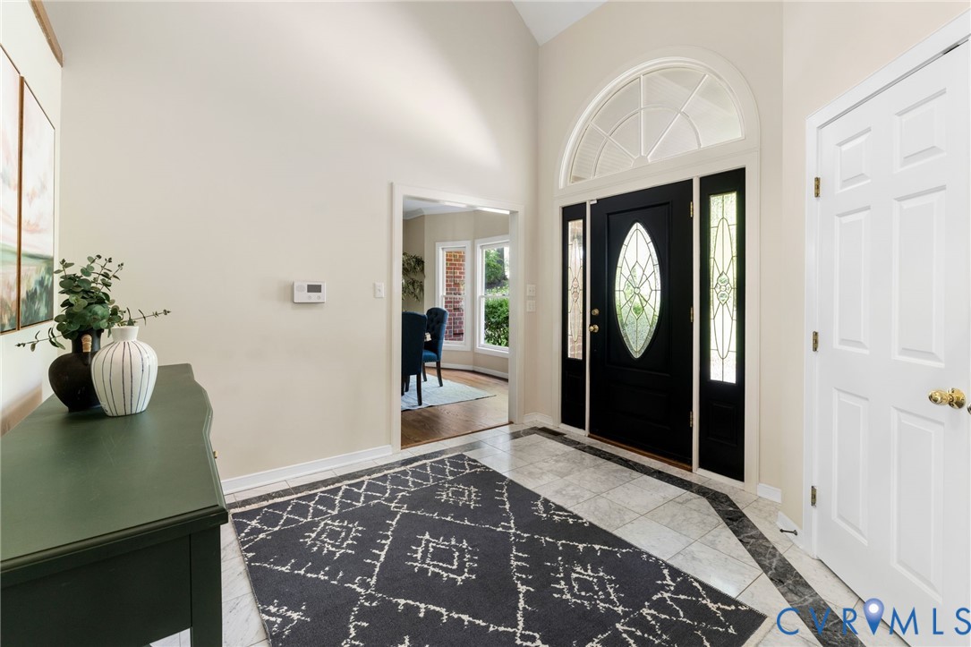 36 Dahlgren Road Richmond, VA 23238 - Photo 6 of 48 a bedroom with a bed and a mirror