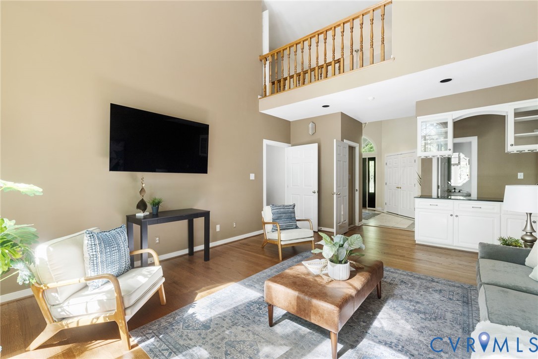 36 Dahlgren Road Richmond, VA 23238 - Photo 10 of 48 a living room with furniture and a flat screen tv