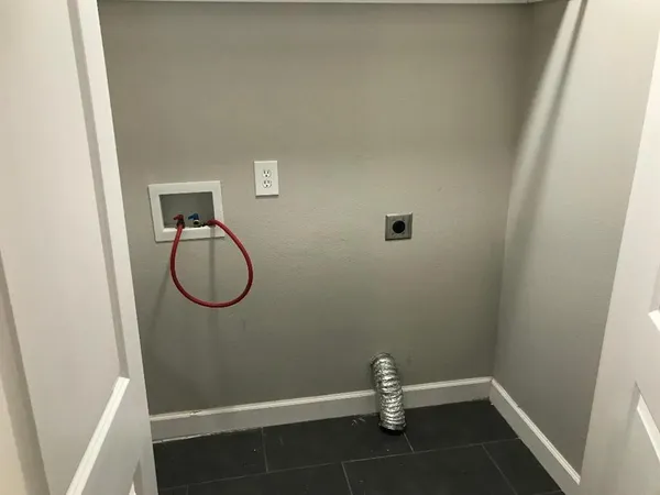 a bathroom with a sink and shower
