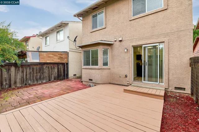 a front view of a house with a wooden floor