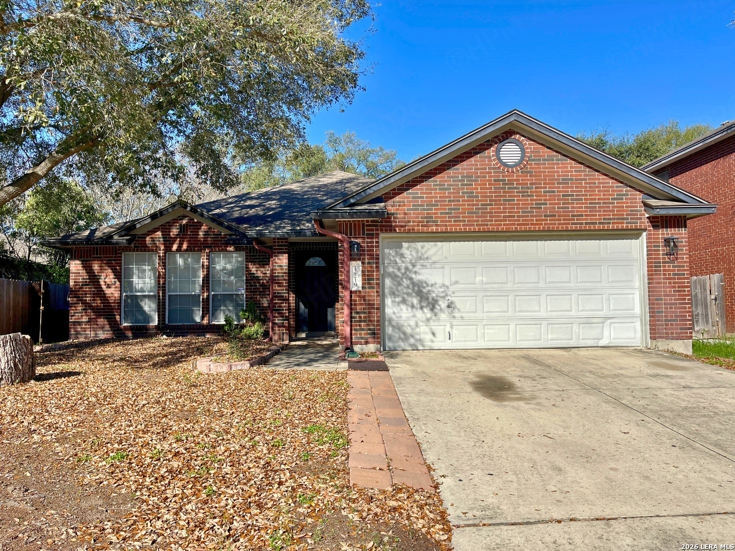 12219 Stable Rd Drive San Antonio, TX 78249 - Photo 1 of 21 a front view of a house with a yard