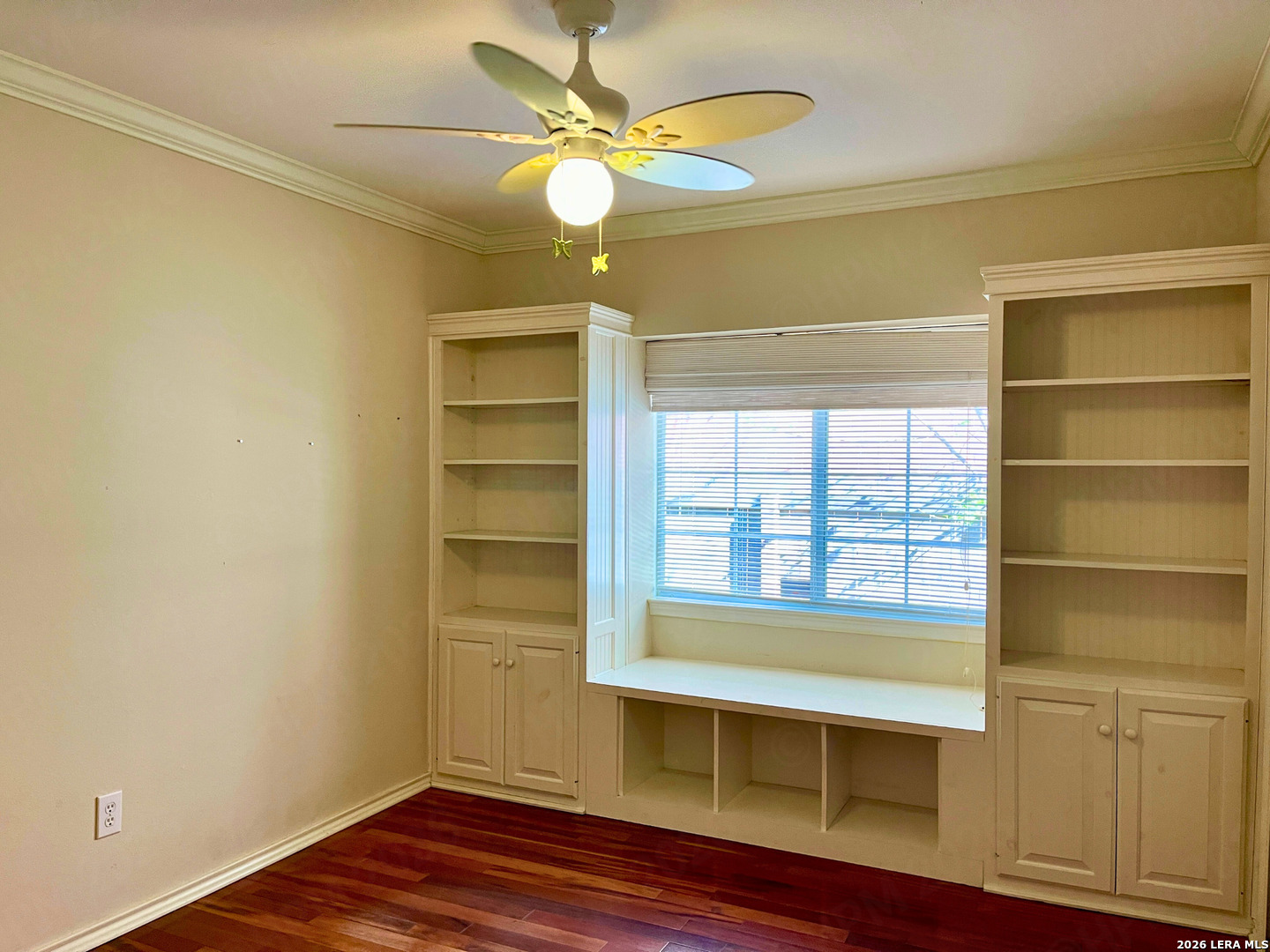 12219 Stable Rd Drive San Antonio, TX 78249 - Photo 16 of 21 a view of an empty room with a window and wooden floor