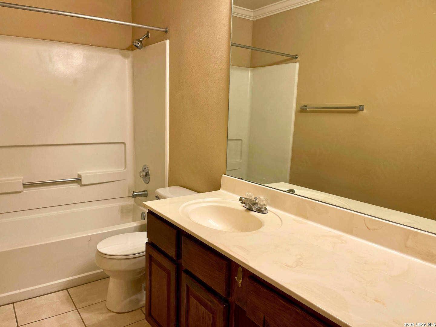 12219 Stable Rd Drive San Antonio, TX 78249 - Photo 17 of 21 a bathroom with a sink a toilet and shower