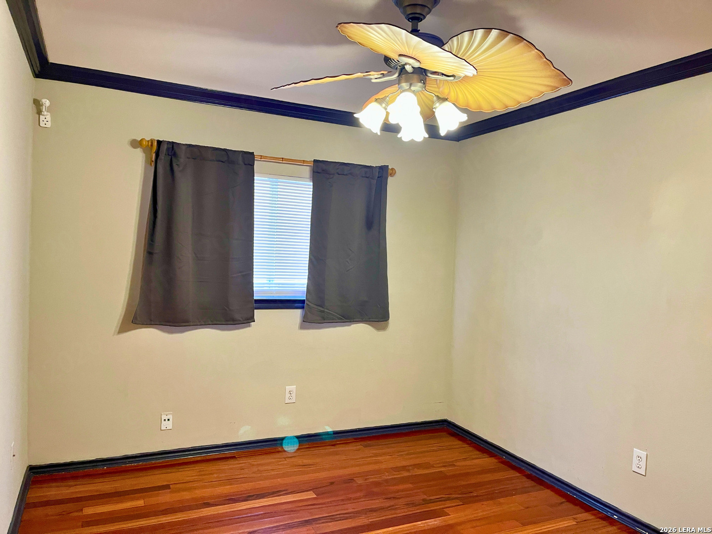 12219 Stable Rd Drive San Antonio, TX 78249 - Photo 18 of 21 a view of a room with wooden floor and door