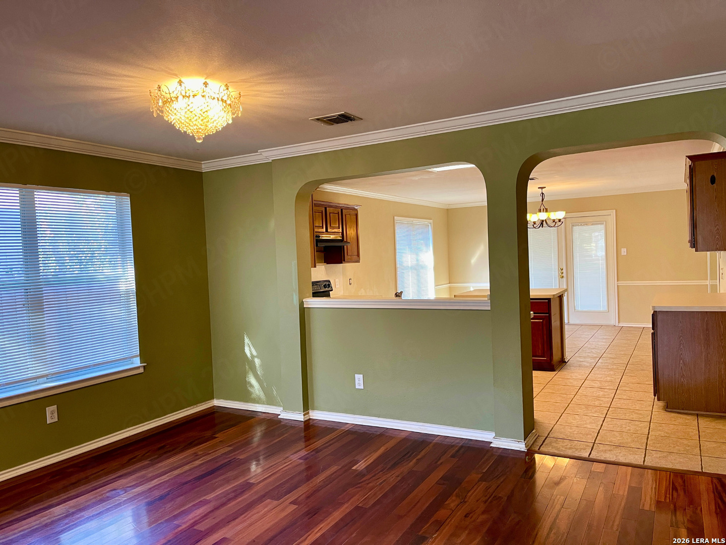 12219 Stable Rd Drive San Antonio, TX 78249 - Photo 8 of 21 a view of room with window and wooden floor