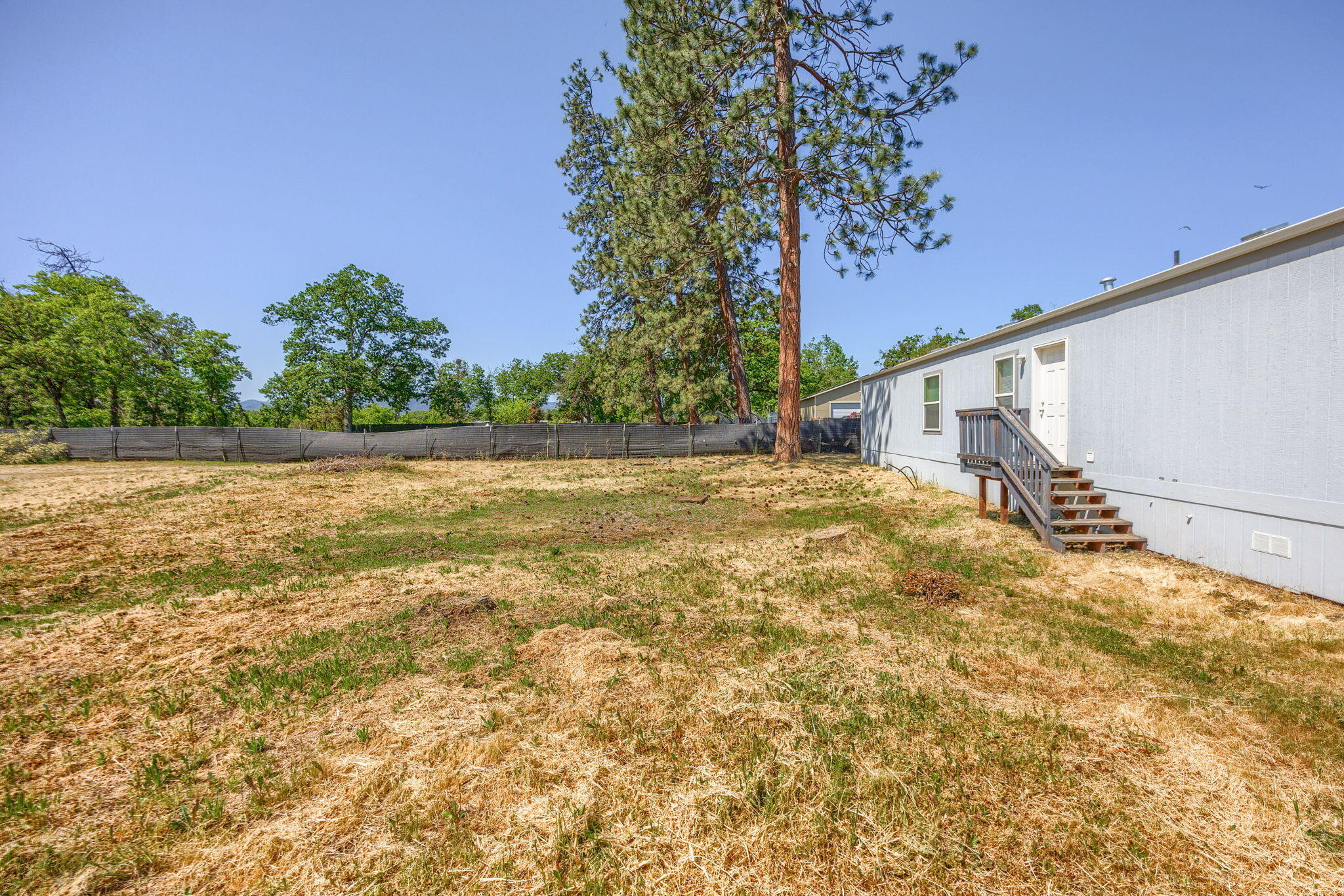 225 Wilson Road Central Point, OR 97502 - Photo 59 of 63 Spacious backyard behind Unit C offers many possibilities!