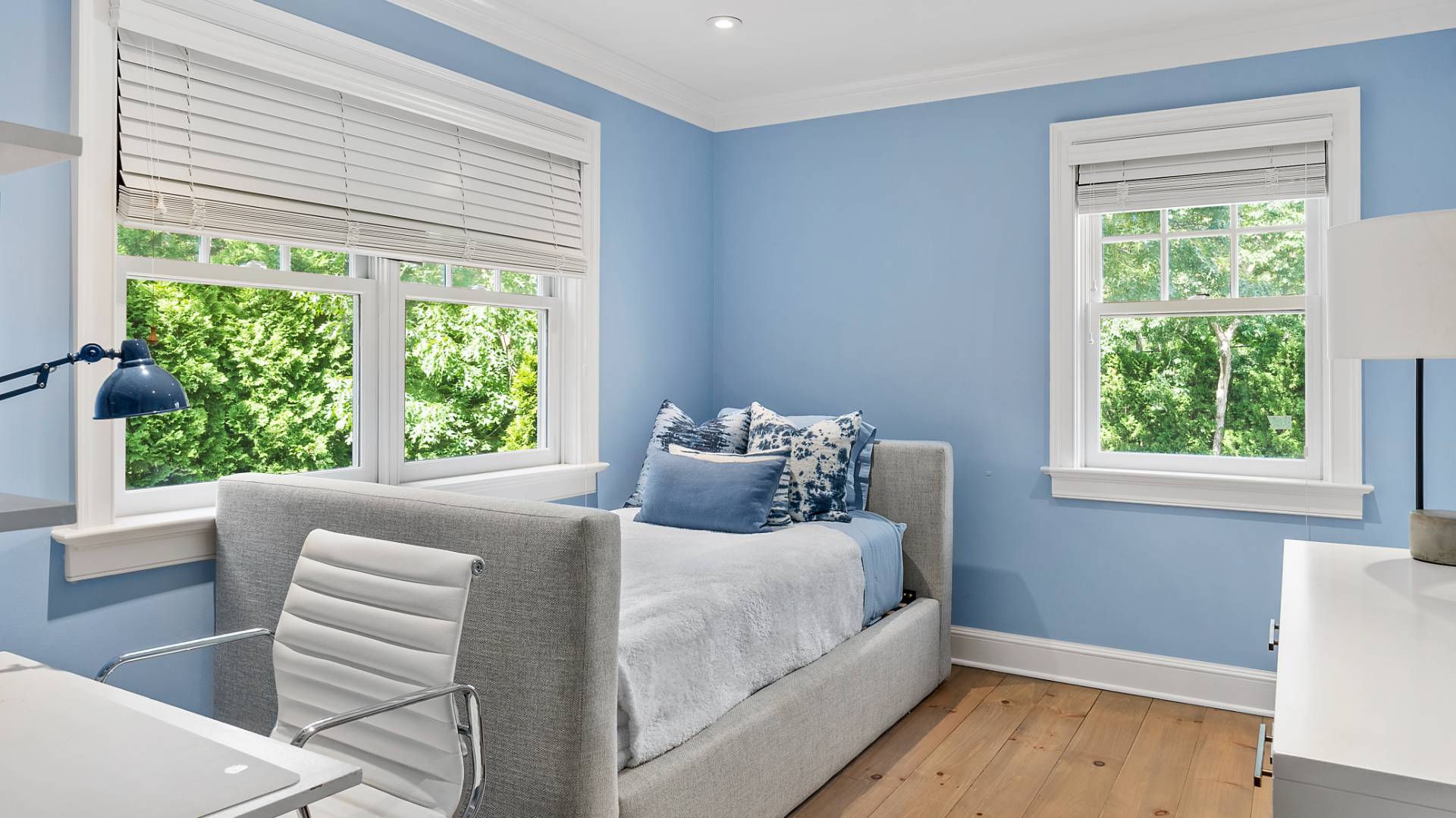 3 Exeter Lane Wainscott, NY 11975 - Photo 12 of 17 a bedroom with a bed and a large window