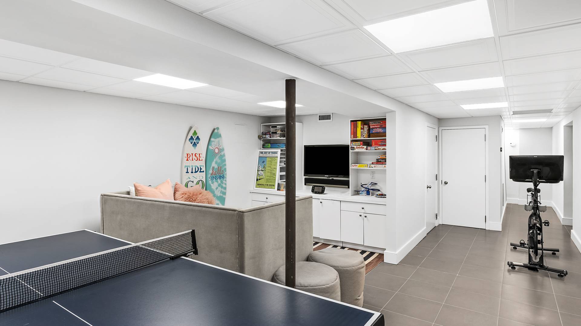 3 Exeter Lane Wainscott, NY 11975 - Photo 15 of 17 a view of a livingroom with furniture and a flat screen tv
