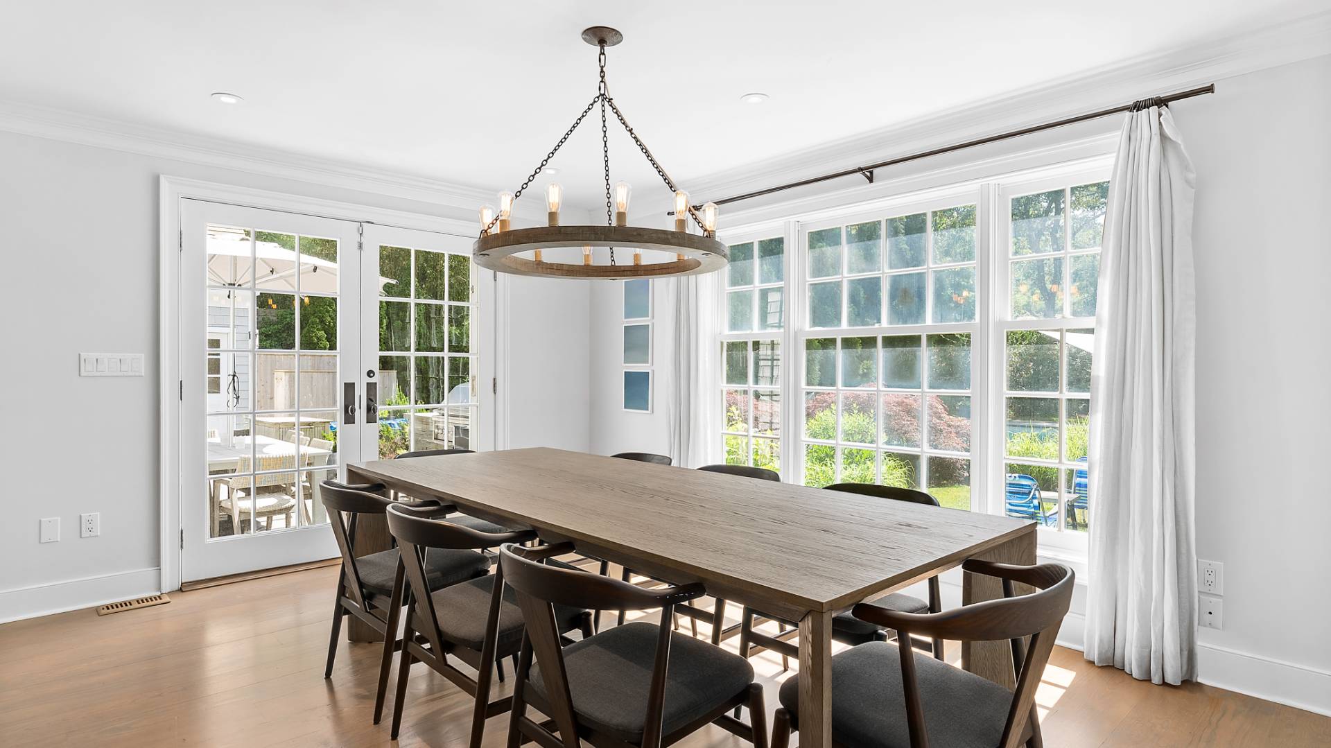 3 Exeter Lane Wainscott, NY 11975 - Photo 5 of 17 a view of a dining room with furniture window and wooden floor