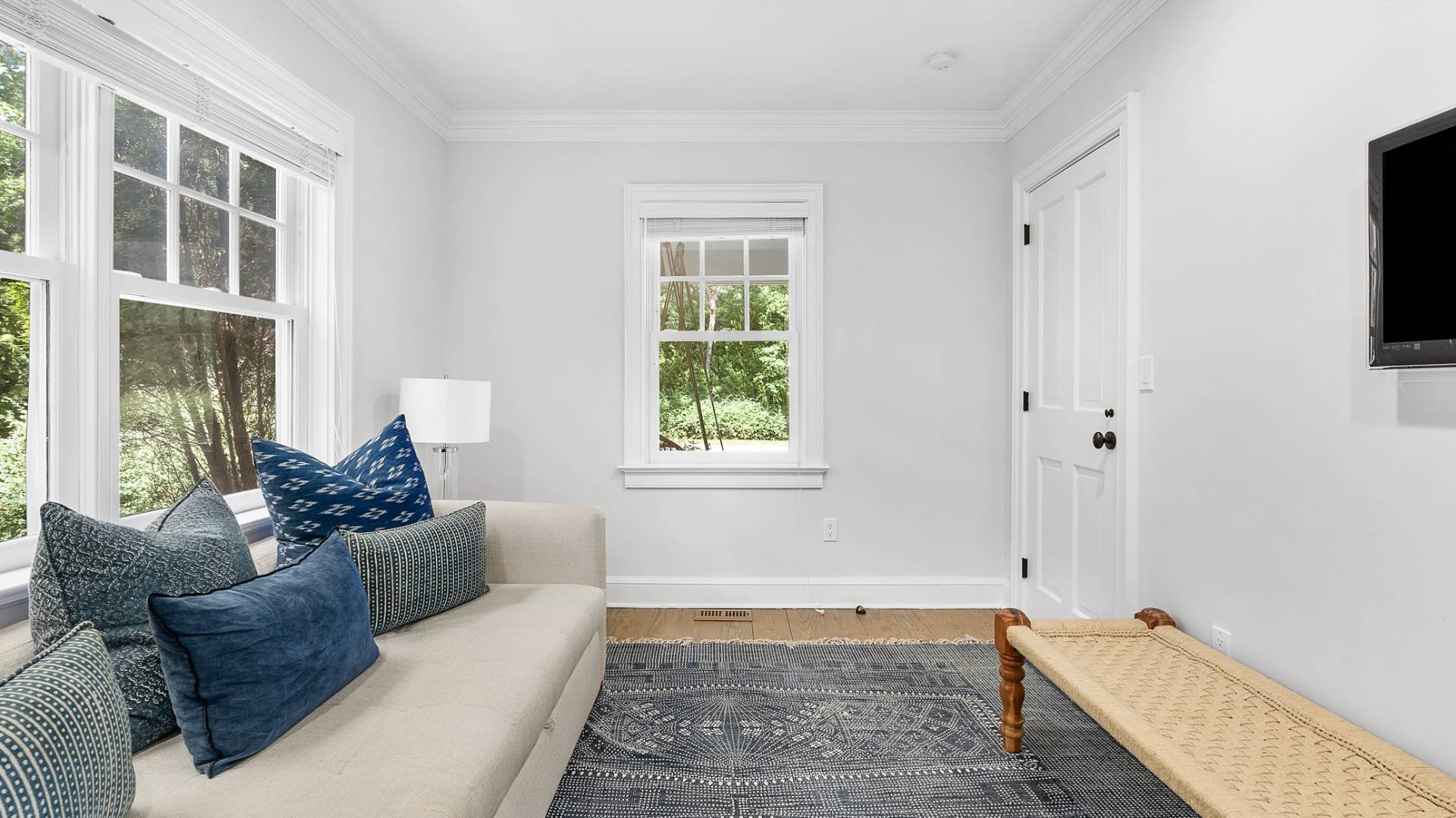 3 Exeter Lane Wainscott, NY 11975 - Photo 8 of 17 a living room with furniture and a window