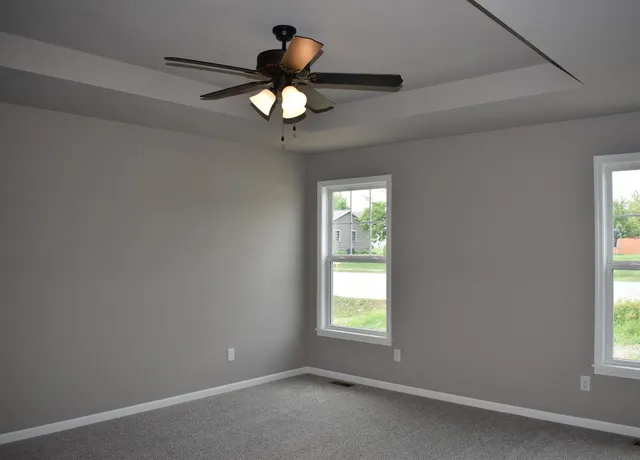 a bathroom with a sink a shower and a mirror