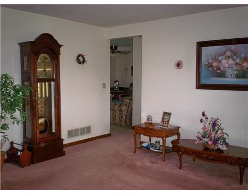 41 Kaufman Road Gibsonia, PA 15044 - Photo 2 of 11 Living Room. Neutral walls and rose carpeting. Double window, window treatment stays. Coat closet in entry.