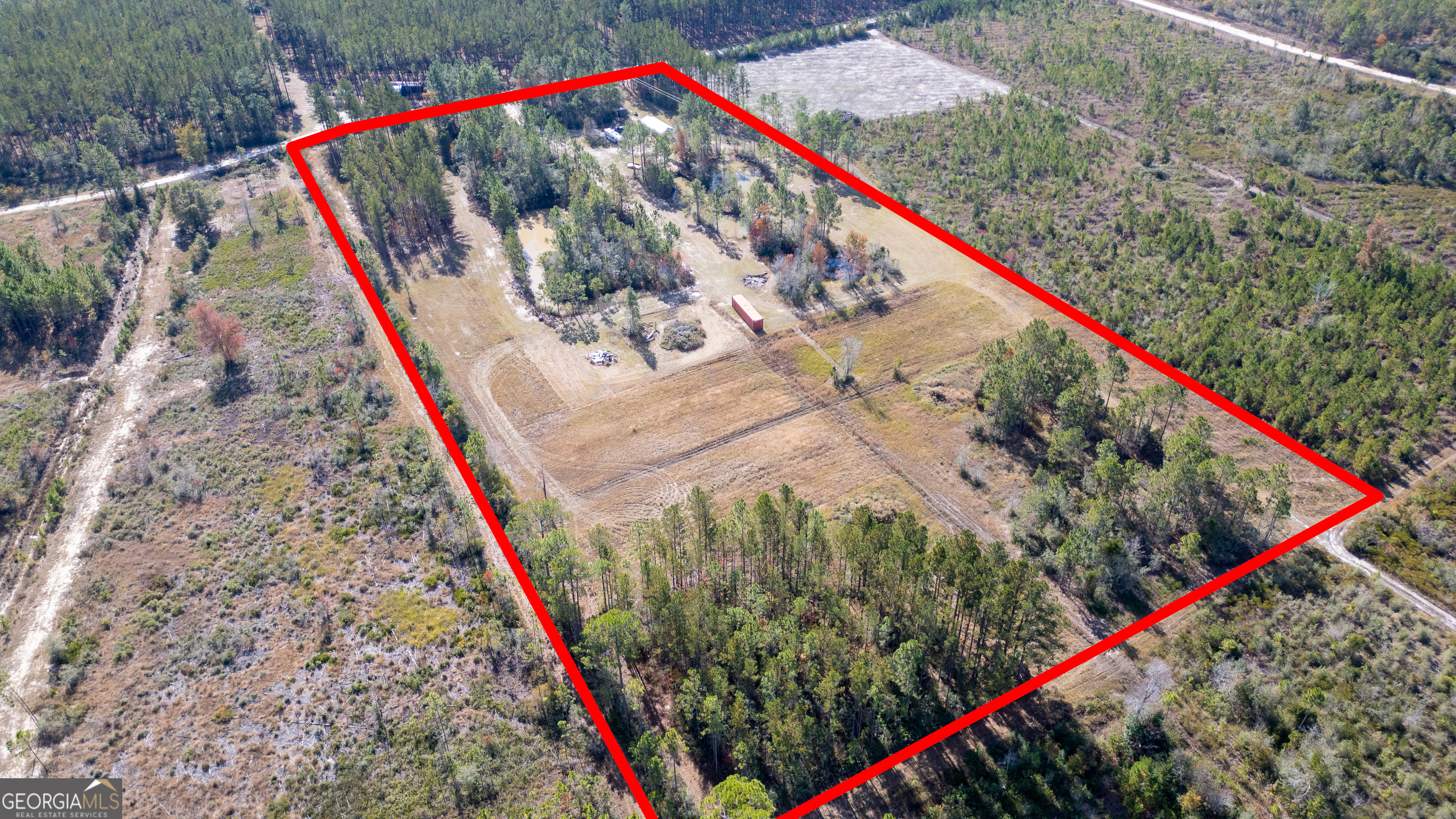 3222 Bertran Trail Waycross, GA 31503 - Photo 2 of 10 a view of a bathtub in the backyard of a house