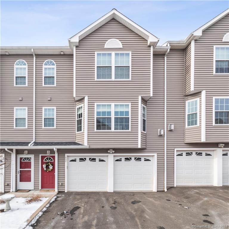 58 Leonard Street, Unit 402 Meriden, CT 06451 - Photo 1 of 1 a front view of a house