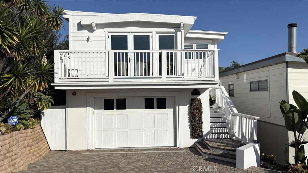 263 Upland Road Laguna Beach, CA 92651 - Photo 51 of 56 a view of a house with many windows