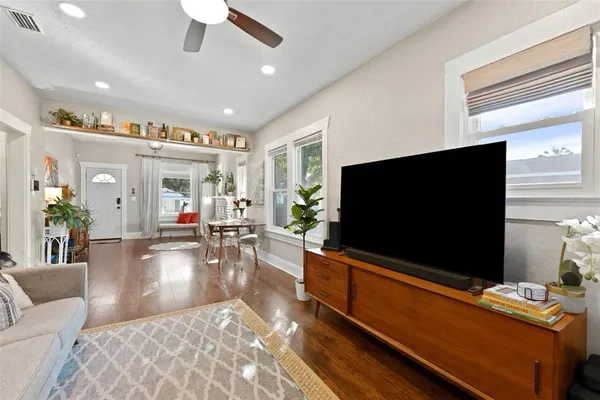 a kitchen with stainless steel appliances granite countertop a refrigerator and a stove