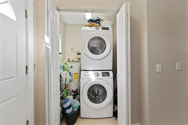 a view of yard with large trees
