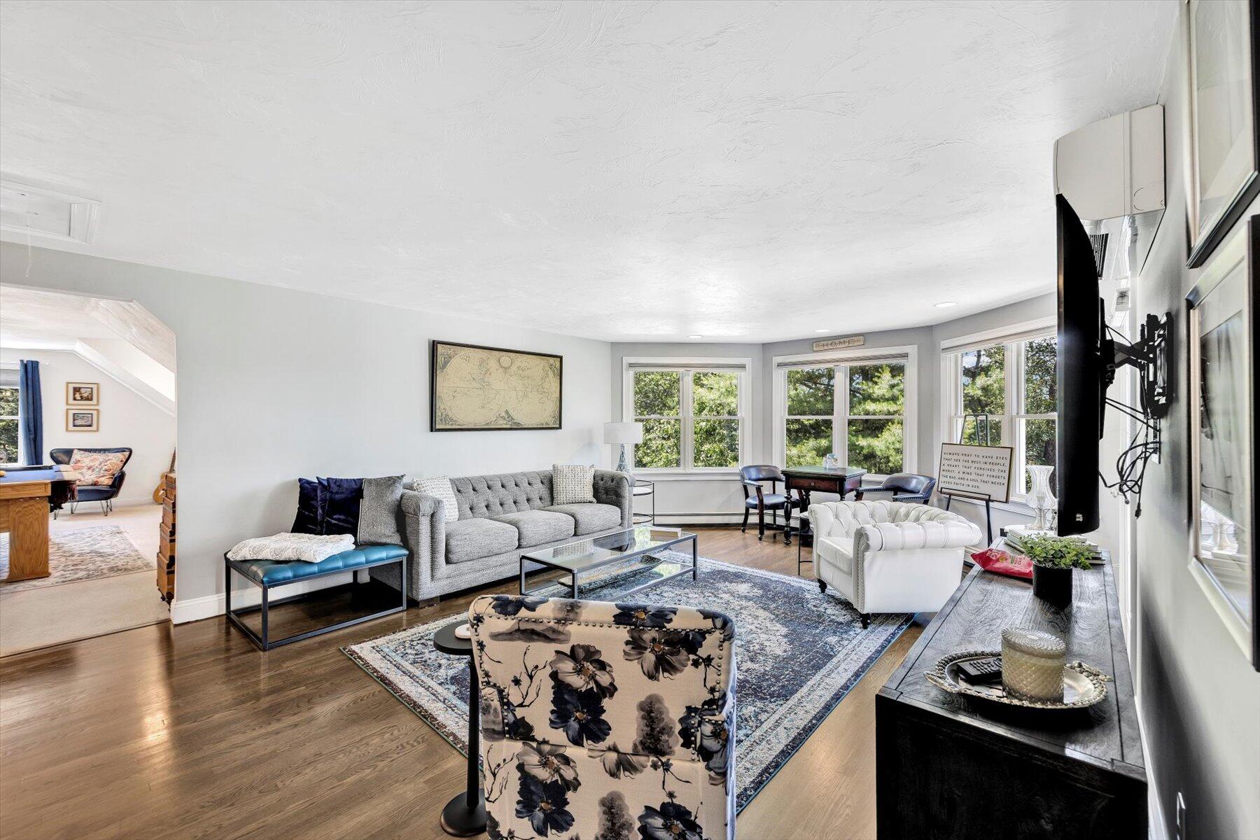 1 Ravens Nest Road Sandwich, MA 02563 - Photo 19 of 46 a living room with furniture and a large window