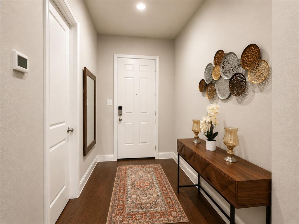 8235 Snapdragon Way Dallas, TX 75252 - Photo 2 of 29 Entryway featuring wood-finish flooring, white paneled doors, and a built-in recessed ceiling light