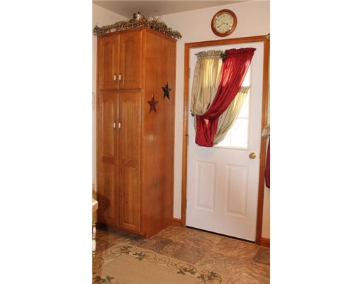 47 Valley View Road Claysville, PA 15323 - Photo 8 of 18 Kitchen. Pantry cabinet kitchen door leads out to the patio and beautiful back yard!