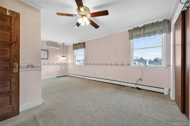 wooden floor in an empty room and a window