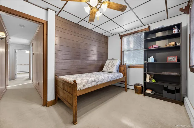 a bedroom with a bed and a walk in closet