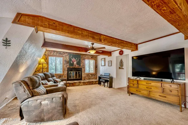 a kitchen with stainless steel appliances granite countertop a refrigerator and stove top oven