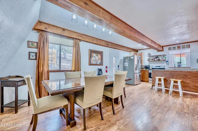 a workspace with furniture and wooden floor