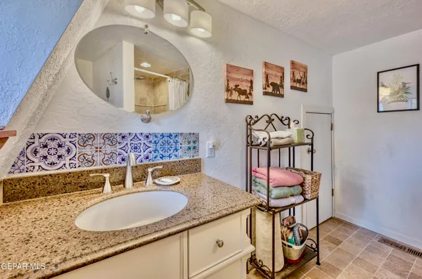 a view of a door and a window