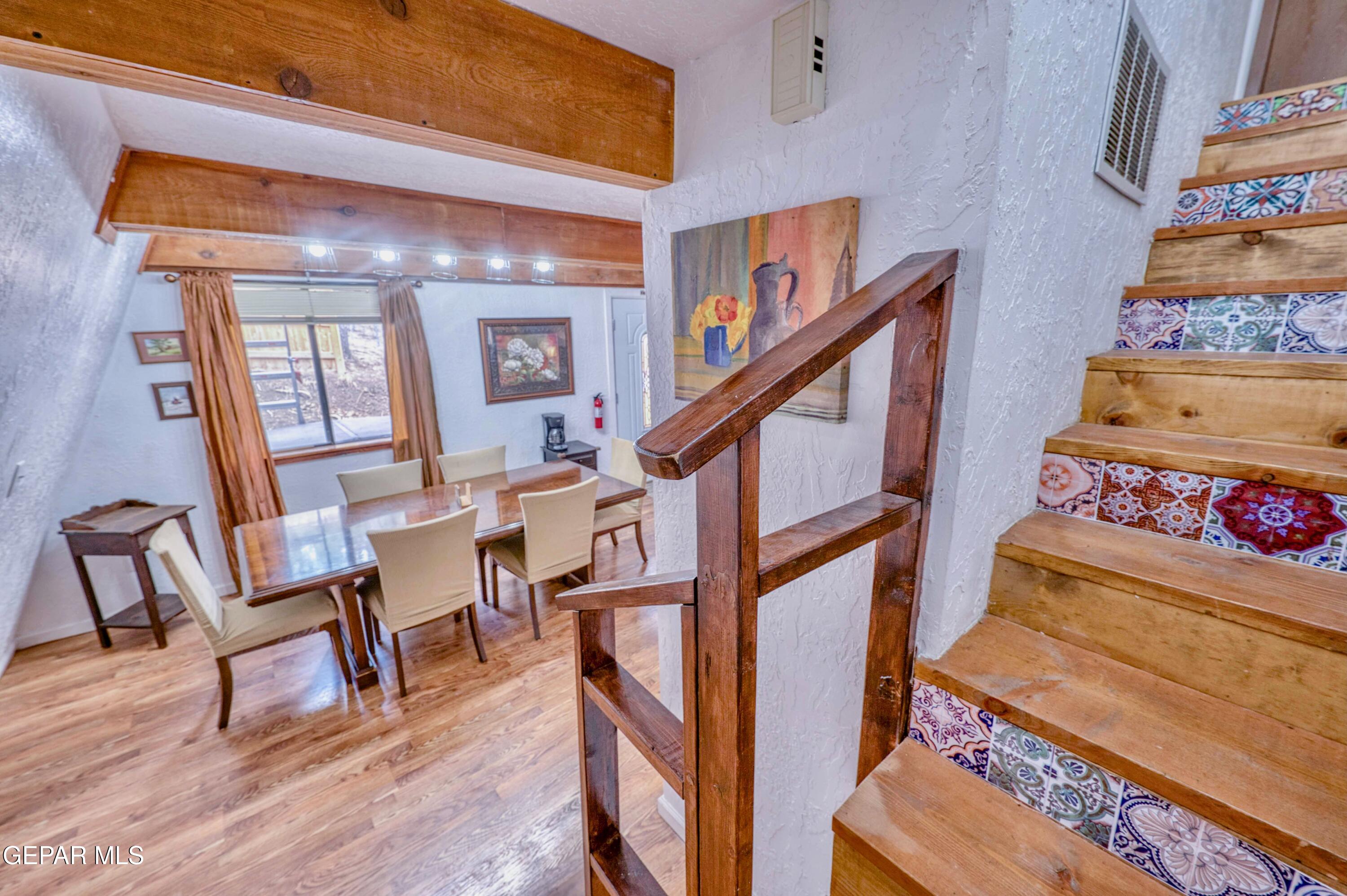 104 Meadow Wood Ruidoso, NM 88345 - Photo 39 of 55 a view of entryway and hall with wooden floor