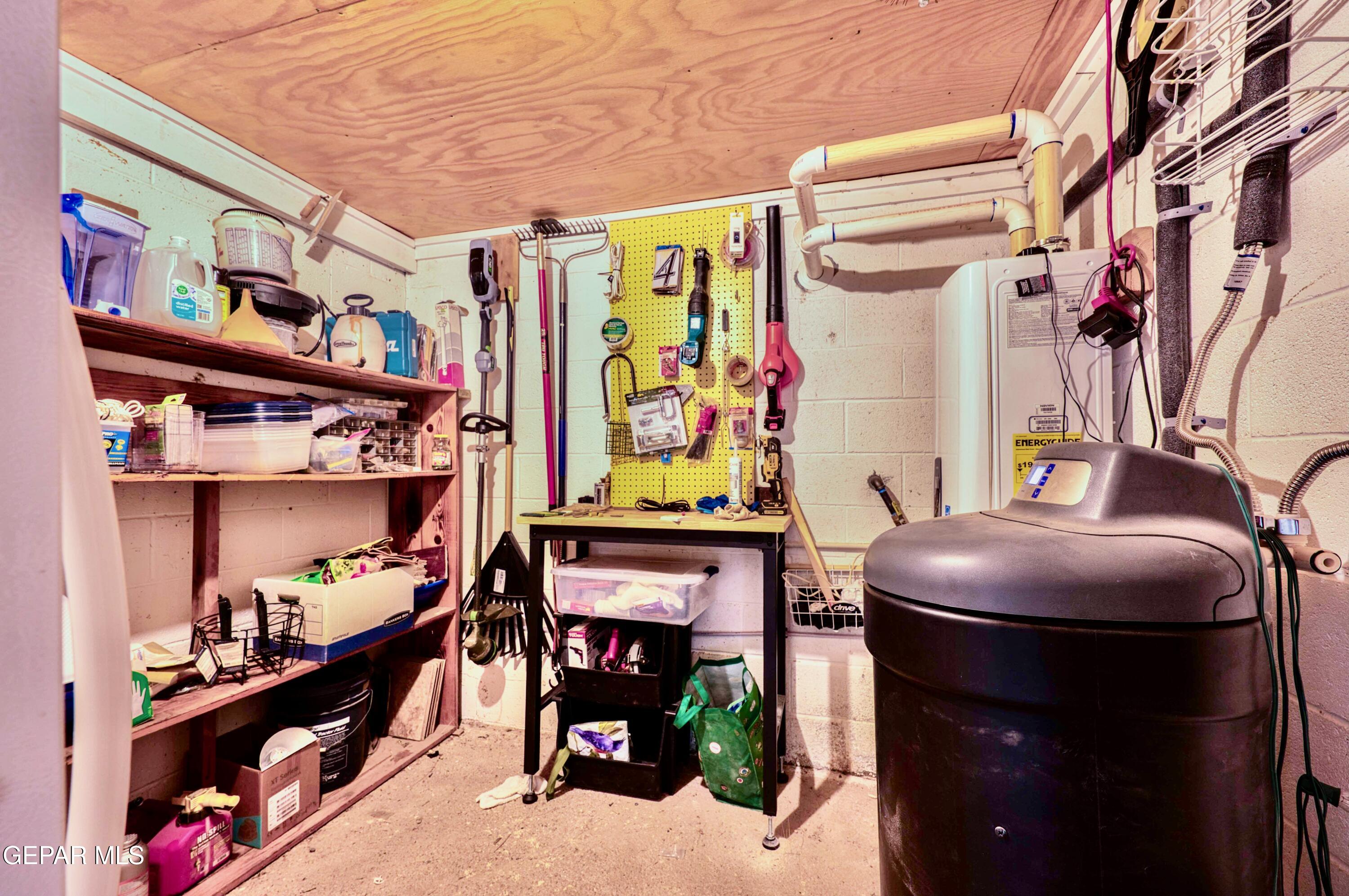 104 Meadow Wood Ruidoso, NM 88345 - Photo 54 of 55 a room with lots of different colored cloths