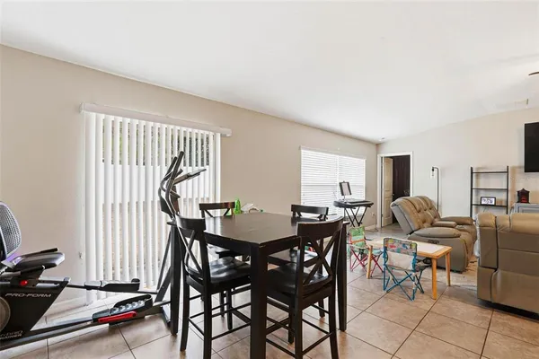 a view of a livingroom with furniture and window