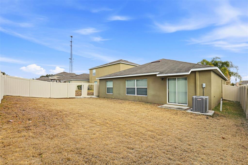 211 English Channel Place Dover, FL 33527 - Photo 34 of 35 a view of a house with a patio