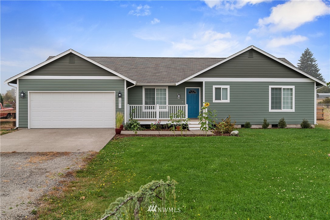 18011 Daryl Lane Southwest Rochester, WA 98579 - Photo 1 of 31 a front view of house with yard and green space