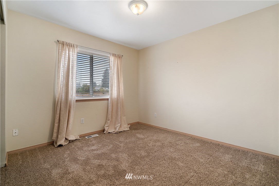 18011 Daryl Lane Southwest Rochester, WA 98579 - Photo 25 of 31 an empty room with windows