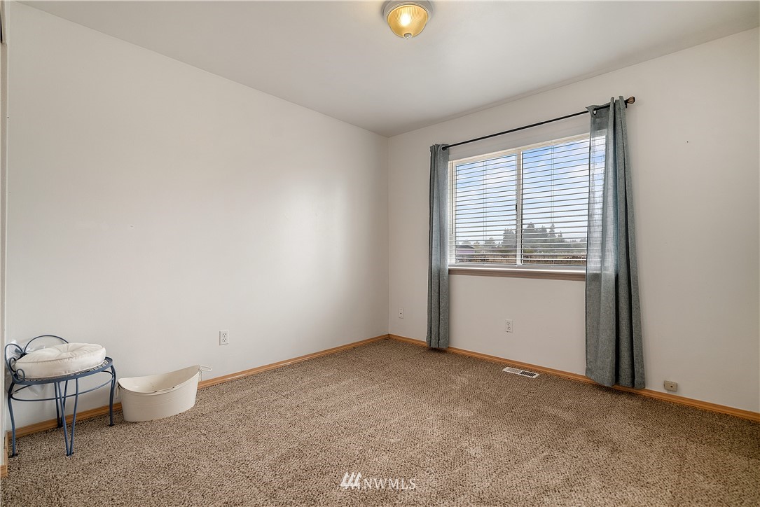 18011 Daryl Lane Southwest Rochester, WA 98579 - Photo 26 of 31 a view of a room with wooden floor and sink