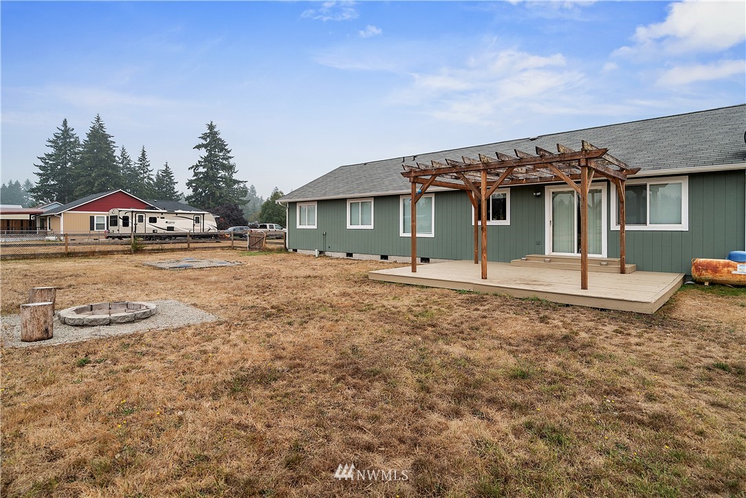 18011 Daryl Lane Southwest Rochester, WA 98579 - Photo 27 of 31 a front view of a house with garden