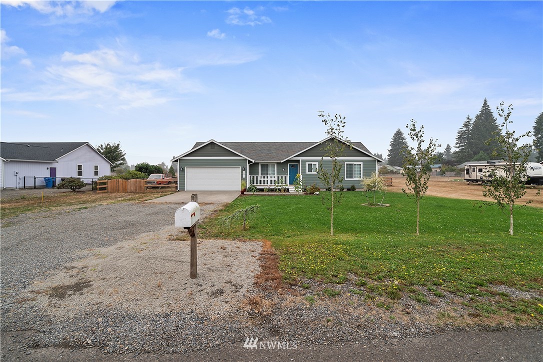 18011 Daryl Lane Southwest Rochester, WA 98579 - Photo 6 of 31 a house view with a garden space
