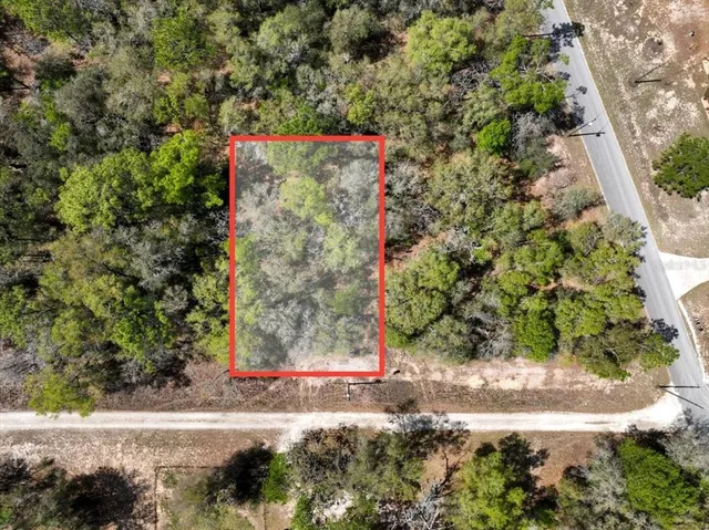 a sign that is on the side of a road