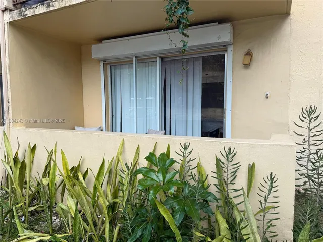 a kitchen with a stove and a refrigerator