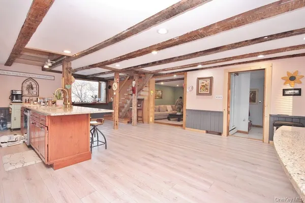a view of a room with wooden roof