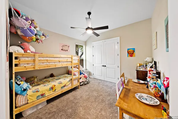 a bed room with a bed and a couch