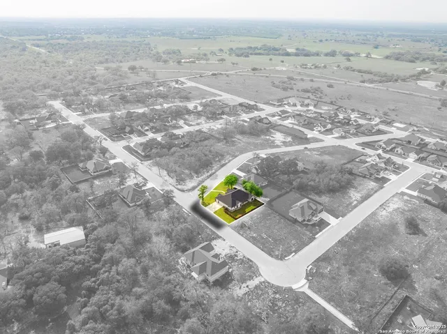 an aerial view of beach and city space