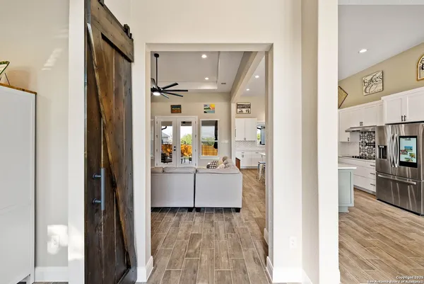 a room with cabinets and wooden floor