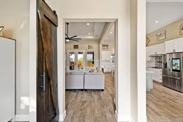a room with cabinets and wooden floor