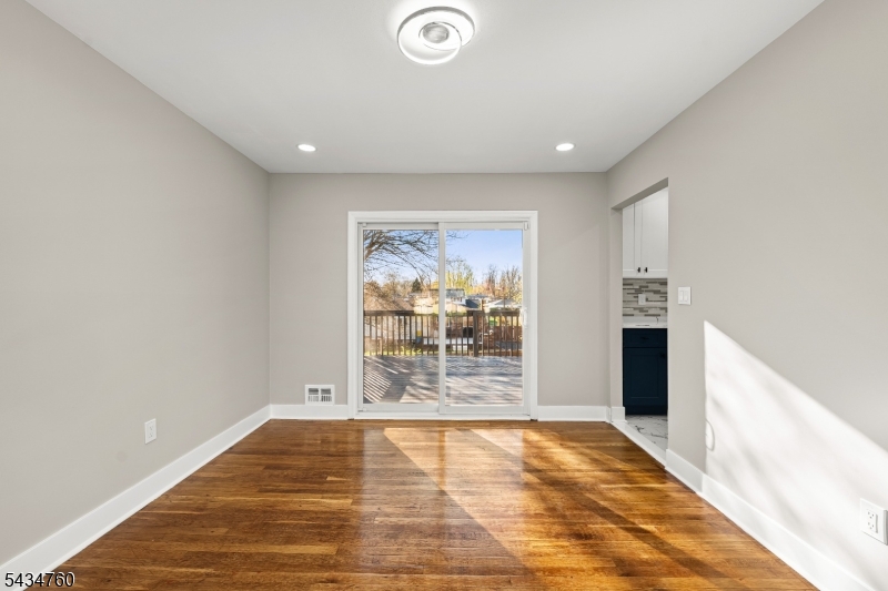 641 Ydv-ham Sq Road Robbinsville, NJ 08691 - Photo 21 of 49 a view of empty room with wooden floor and fan