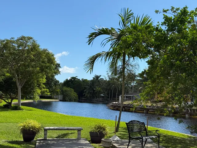 a view of a swimming pool with a patio